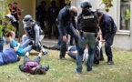 Un "commando" sème la terreur dans un village/ Un chef de famille et son petit-fils décapités ; 3 autres tailladés.